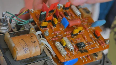 An overview of an old chip of radio components mounted on a close-up board Video stock 120363224