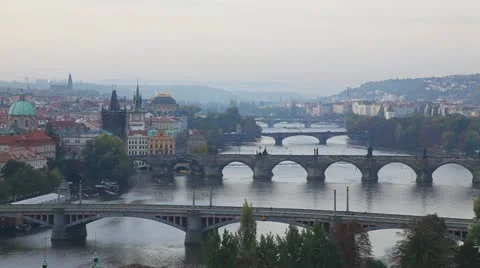 Overview of old Prague with Charles bridge side at sunset Stock Footage 20526637