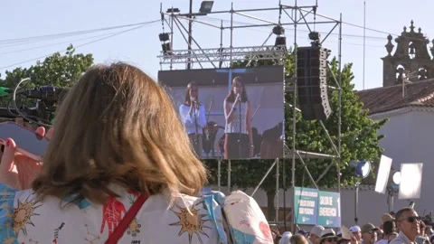 Overview of Papal Event with Giant Screen Broadcast and Camera Equipment in Stock Footage 343458892