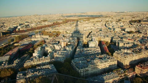 Overview of Paris from the Eiffel tower, with the tower casting a large shadow Stock Footage 313412172