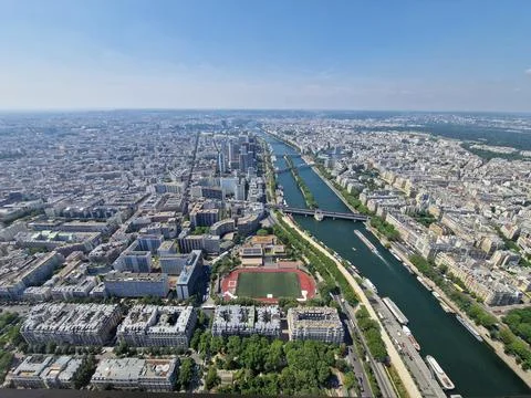 Overview of Paris as seen from the Eiffel Tower on a sunny day. Stock Photos
