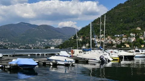 Overview on part of the port of Como and mountains Stock Footage 110741580