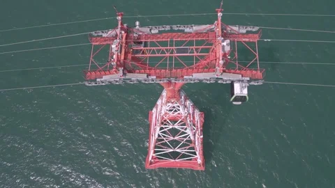 Overview of red cable car structure above the water Stock-Footage 308246662