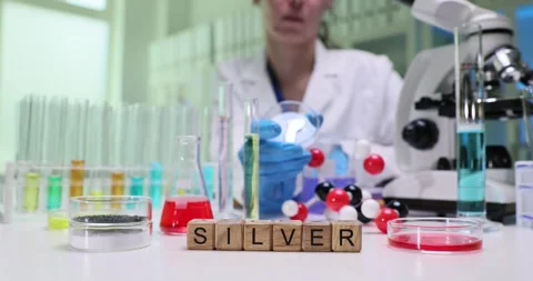 Overview of scientific research on silver elements in labs, focusing on Stock Footage 308863431