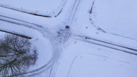 Overview Of Snow Blanketed Junction With Tracks Crossing And Lone Tree In Pale Stock-Footage 327050836