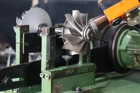 Overview of a specialized balancing and testing machine in a workshop with .. Stock Photos