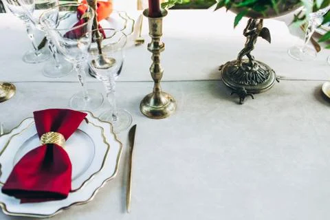 Overview of a stylish served dinner table. Stock Photos
