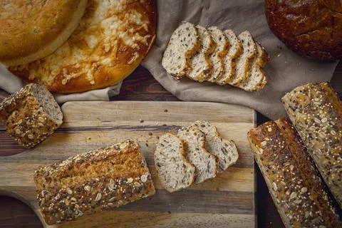 Overview of various breads and slices of bread. Stock Photos