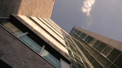 Overview of the walls of a multi-storey building at sunset Stock Footage 91586327