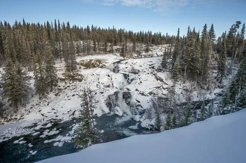 Overview of a Waterfall at Cameron River in Hidden Lake Territorial Park Stock Photos