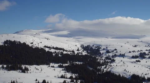 Overview wild snow nature clouds snow trees and blue sky. Stock Footage 60416200