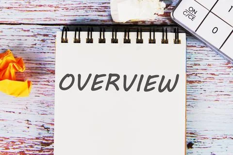 Overview word written on a sheet of notebook lying on old vintage boards with Stock Photos