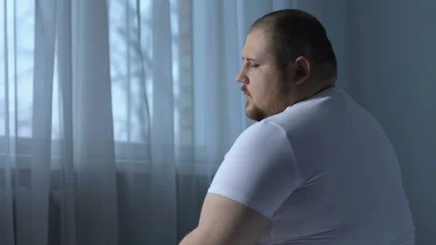 Overweight man massaging elbow joint, feeling pain, rehabilitation center client Stock Footage 89746905