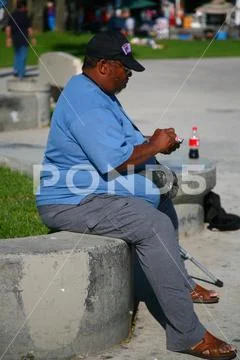 Overweight man in a square Stock Photos