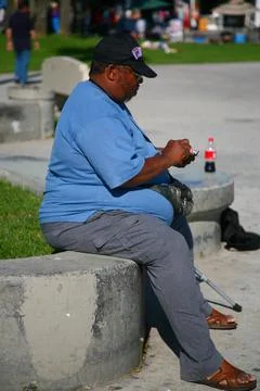 Overweight man in a square Stock Photos