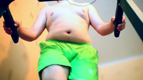 Overweight man on the treadmill Stock Footage 52997405