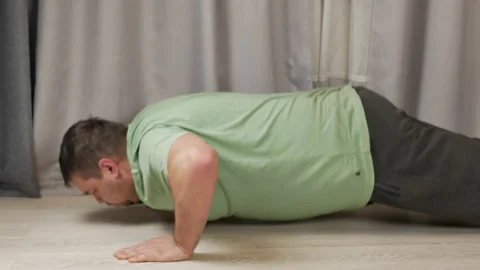 Overweight mans workout Stock Footage 147482347