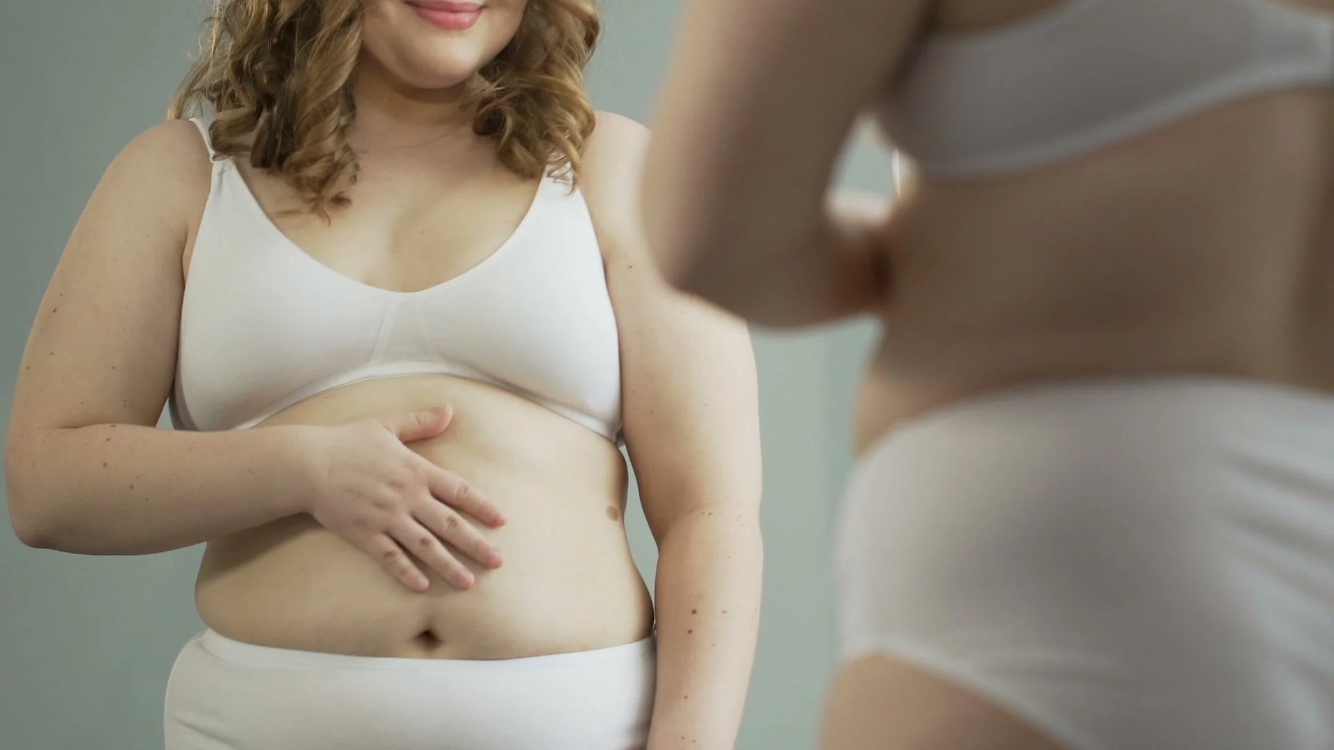 Overweight woman in underwear looking at, Stock Video