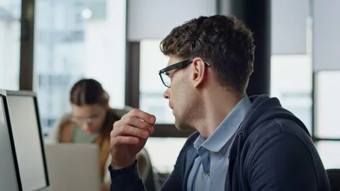 Overwhelmed manager working computer closeup. Tired thoughtful man rubbing eyes Photos