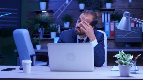 Overworked businessman sits in front of the computer Stock Footage 111322511