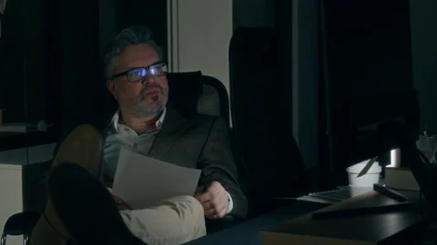 Overworked Corporate Lawyer Studying Document Draft in Middle of Night in Office 스톡 동영상 331861473