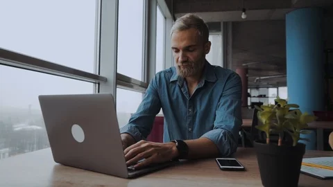 Overworked minded man having headache after working day Stock Footage 99636723