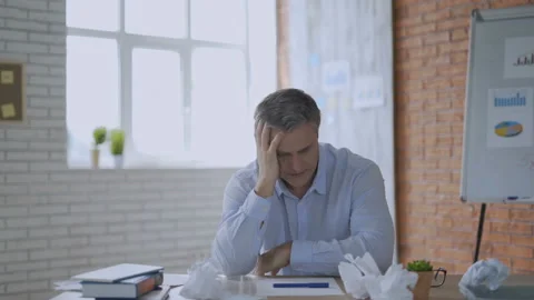 Overworked minded man having headache after working day 4K Stock Footage 112830647