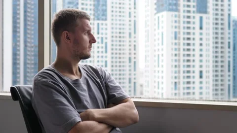Overworked tired office man looking in the window. Stress at the workplace Stock Footage 158524421