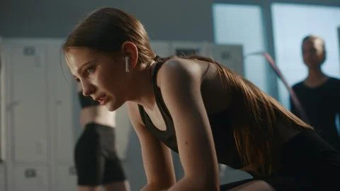 Overworked Young Dancer Staring with Resentment inside Dressing Room Stock Photos