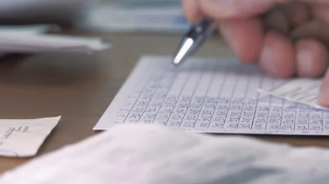 Overwrite the desired data from the invoice document. Macro Stock Footage 55256222