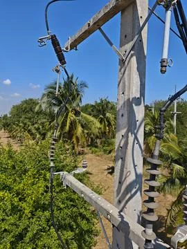 Ow angle view of high voltage electrical drop out fuse cutout device. Stock Photos