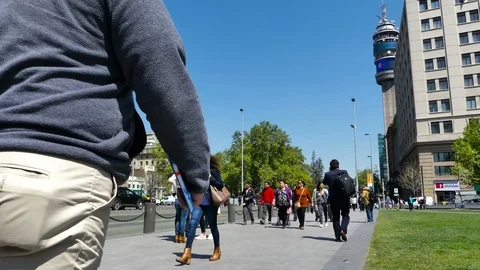 Ower angle view of pedestrians on the Palacio de la Moneda plaza Stock Footage 98110164