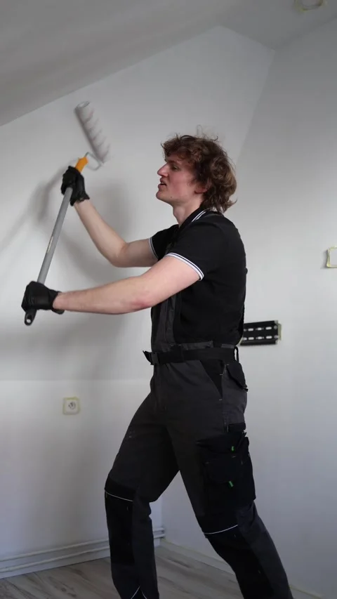 Owner repainting apartment before renting Stock Footage 334592653