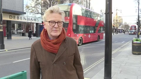 Oxford St shoppers react to Debenhams liquidation news Video stock 148556099