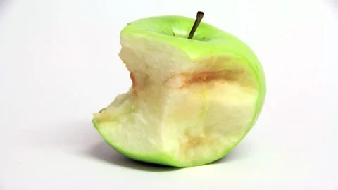 Oxidation process of the inside of a bright green apple as it turns brown Stock Footage 265667487