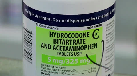 Oxycodone and hydrocodone pill bottles Stock Footage 24773059