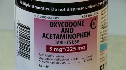 Oxycodone and hydrocodone pill bottles Stock Footage 24773123