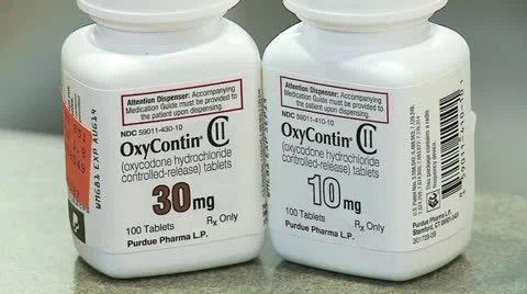 Oxycodone and hydrocodone pill bottles Stock Footage