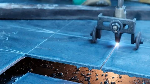 Oxycut with blue flame on a sheet of steel. Close up Stock Footage 101637589