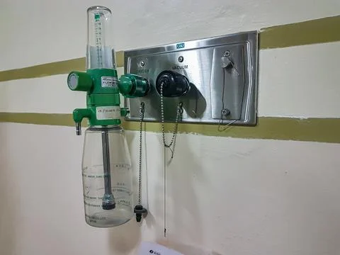 An oxygen and sunction plug sockets on the wall in a hospital patient room. C Stock Photos