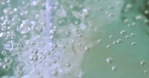 Oxygen bubbles in an aquarium, representing aquatic life, water filtration Stock Footage 335230847