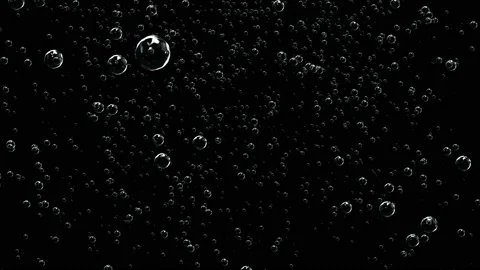 Oxygen bubbles making an interesting texture of either water or space Stock Footage 114799404