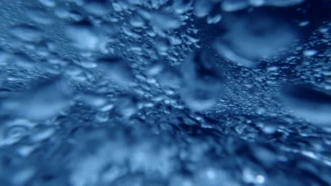 Oxygen bubbles under water Stock Footage 154415320