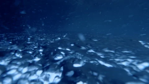 Oxygen bubbles under water Stock Footage 154416054