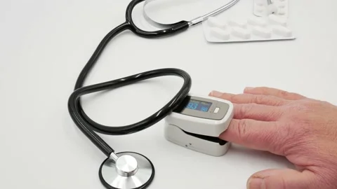 Oxygen measurement with an oximeter Stock Footage 144558377