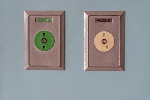 Oxygen plug and Vacuum plug on wall Stock Photos