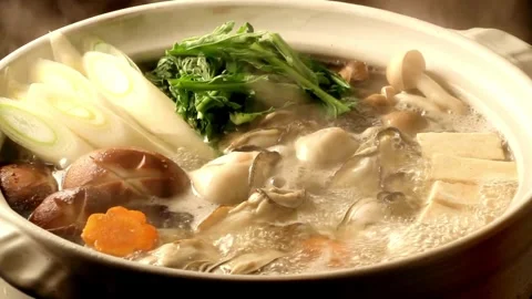 Oysters and vegetable stew Stock Footage 266123130