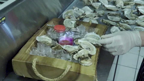 Oysters prepare Stock Footage 134854281