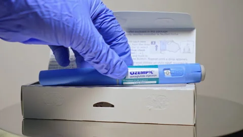 Ozempic Injection box package and pen closeup display with instructions. Oz.. Stock Footage 320086079