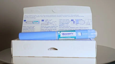Ozempic Injection box package and pen closeup display with instructions. Oz.. Stock Footage 320086080